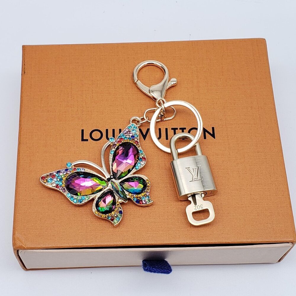 Authentic Louis Vuitton Gold Lock & Box w/ Unbranded Butterfly Bagcharm